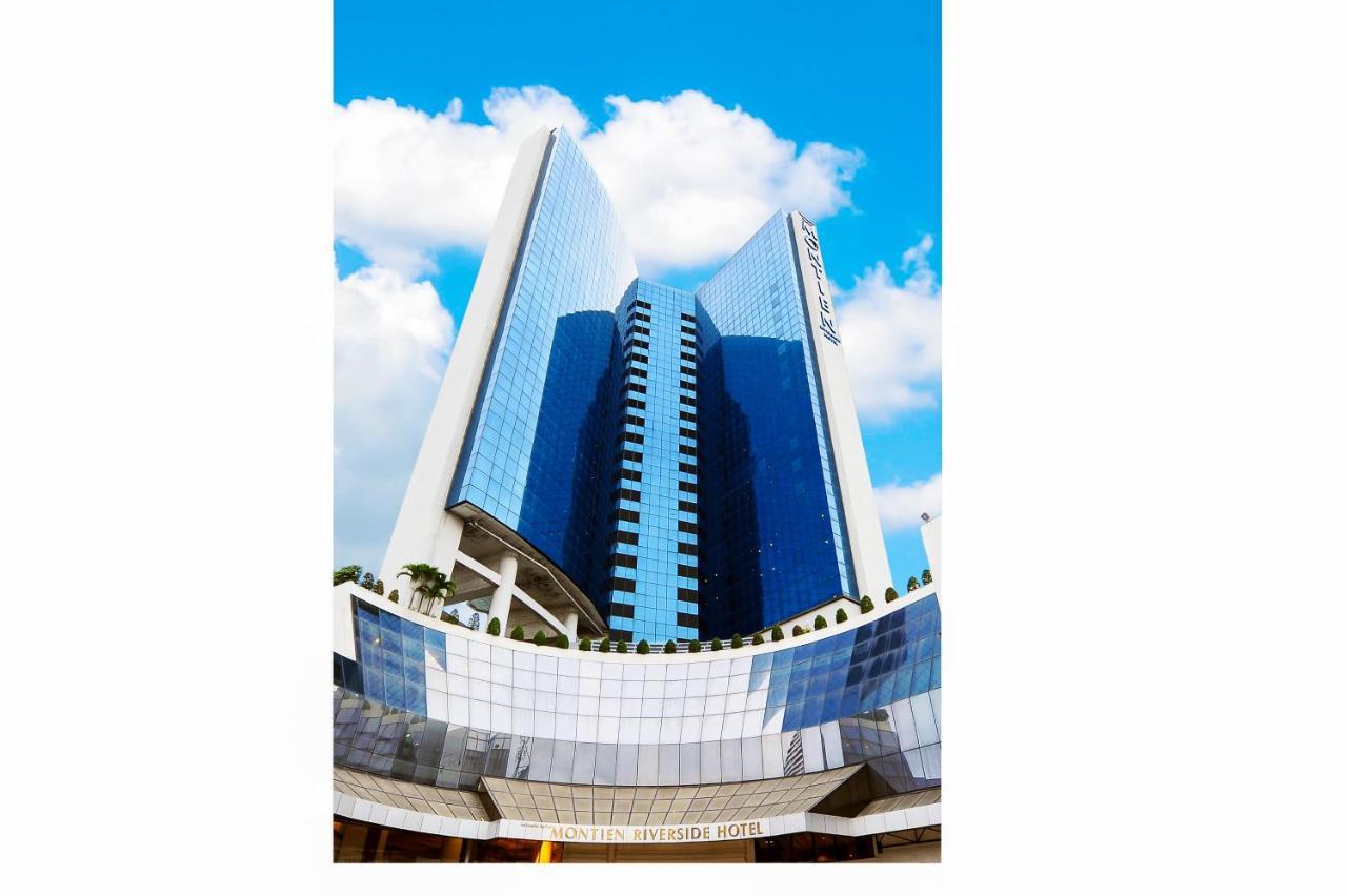 Montien Riverside Hotel Bangkok Exterior photo The new building of the university